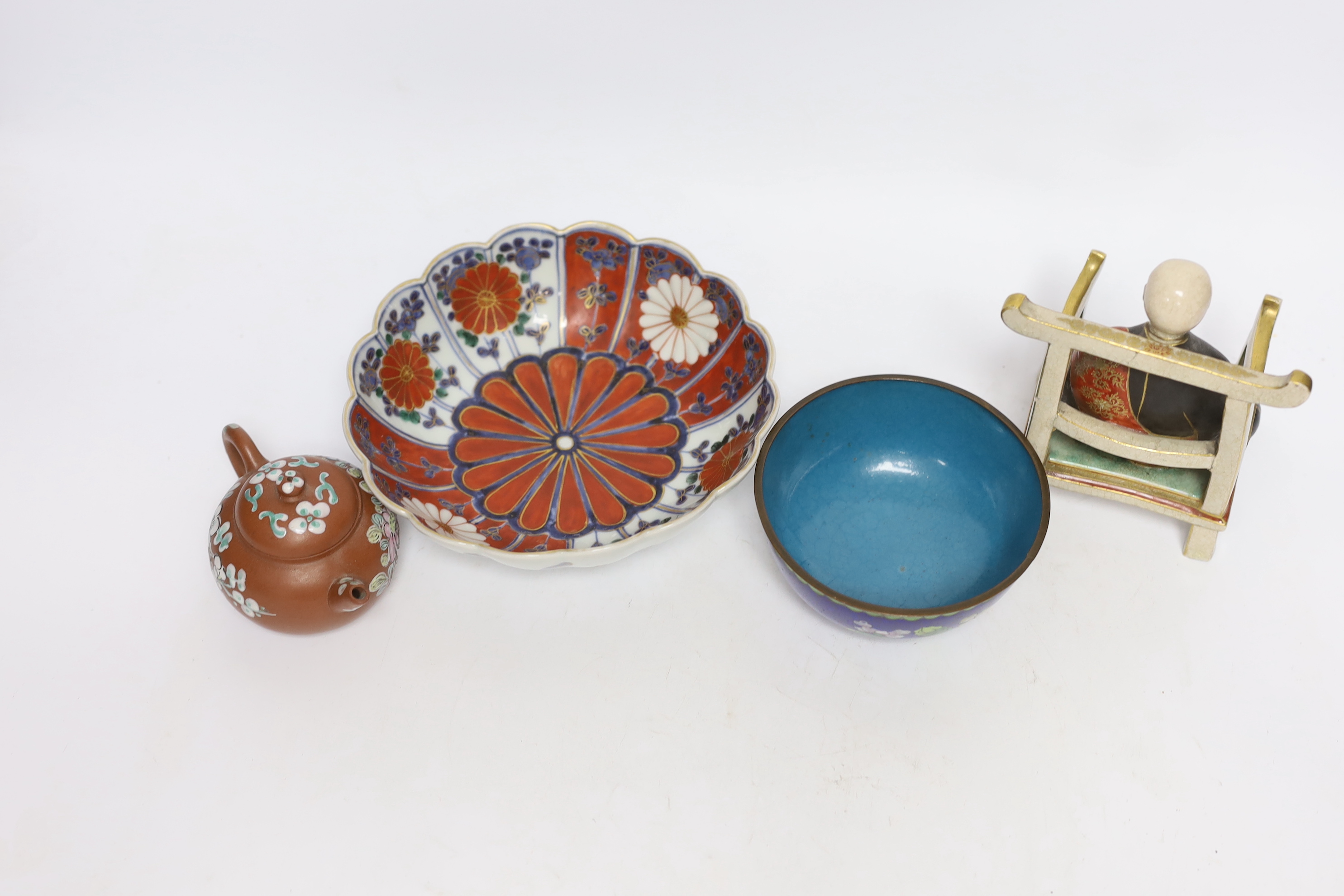 A Chinese enamelled yixing teapot and cloisonné bowl together with a Japanese Imari bowl and a Satsuma seated figure of a Buddhist monk, tallest 14cm